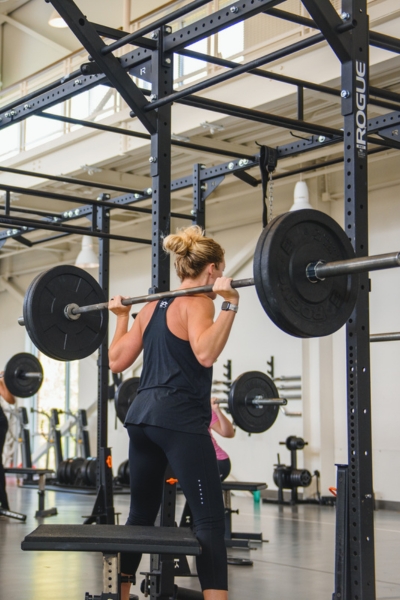 Woman lifting weight in the Lift Wellness Center